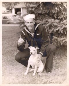 Dad with dog Tonto in Navy uniform WWII