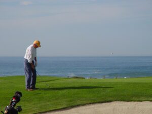 man on 14th hole of MPCC ocean golf course